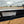 Load image into Gallery viewer, 2026 PJ CE 7X20 EQUIPMENT HAULER w/ Dove and Stand up ramps 9990#