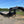 Load image into Gallery viewer, 2026 PJ LD 8.5x28' Dual Flatbed Gooseneck w/ Monster Ramps