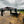 Load image into Gallery viewer, 2027 PJ 8.5X25 LQ FLATBED GOOSENECK W/ MONSTER RAMPS/14 PLY TIRES/15680# GVWR
