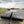 Load image into Gallery viewer, 2027 PJ 8.5X25 LQ FLATBED GOOSENECK W/ MONSTER RAMPS/14 PLY TIRES/15680# GVWR

