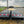 Load image into Gallery viewer, 2027 PJ 8.5X25 LQ FLATBED GOOSENECK W/ MONSTER RAMPS/14 PLY TIRES/15680# GVWR
