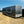 Load image into Gallery viewer, PREOWNED 2025 CARMATE 8X20 ADVANTAGE W/ ADDITIONAL HEIGHT/AWNINGS/VINYL WALLS/AC UNIT/ BARN DOORS
