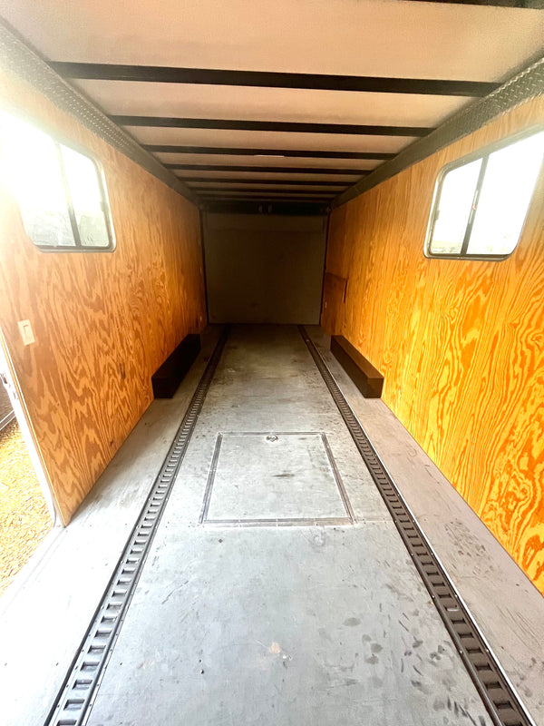 PREOWNED 2022 CARMATE 8X20 ADVANTAGE W/ RAMP/12" ADDITIONAL HEIGHT
