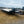 Load image into Gallery viewer, PREOWNED 2025 PJ F8 8.5X24 DECKOVER EQUIPMENT TRAILER 14000# GVWR
