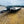 Load image into Gallery viewer, PREOWNED 2025 PJ F8 8.5X24 DECKOVER EQUIPMENT TRAILER 14000# GVWR
