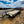 Load image into Gallery viewer, 2026 Car Mate 6x16 Angle Iron 7K GVWR W/ SIDE RAMPS
