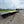 Load image into Gallery viewer, 2027 PJ 8.5X28 LS LOW PRO FLATBED GOOSENECK W/ MONSTER RAMPS/ 15680# GVWR

