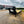 Load image into Gallery viewer, 2027 PJ 8.5X25 LQ FLATBED GOOSENECK W/ MONSTER RAMPS/15860# GVWR
